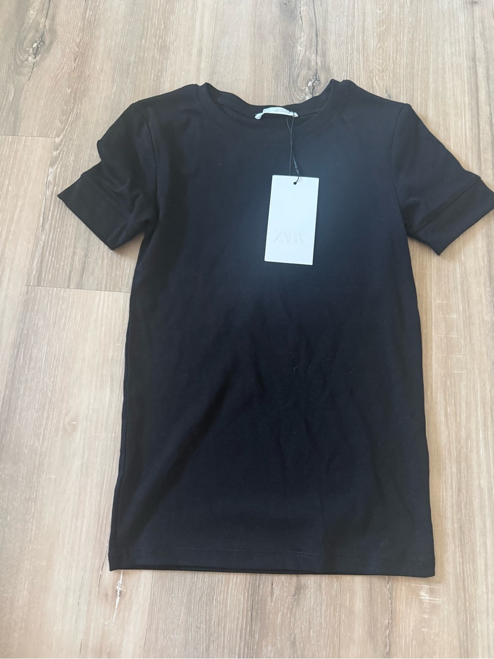 Black short sleeve top by Zara